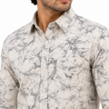 men's printed casual shirt features a grey and white marble-like pattern.